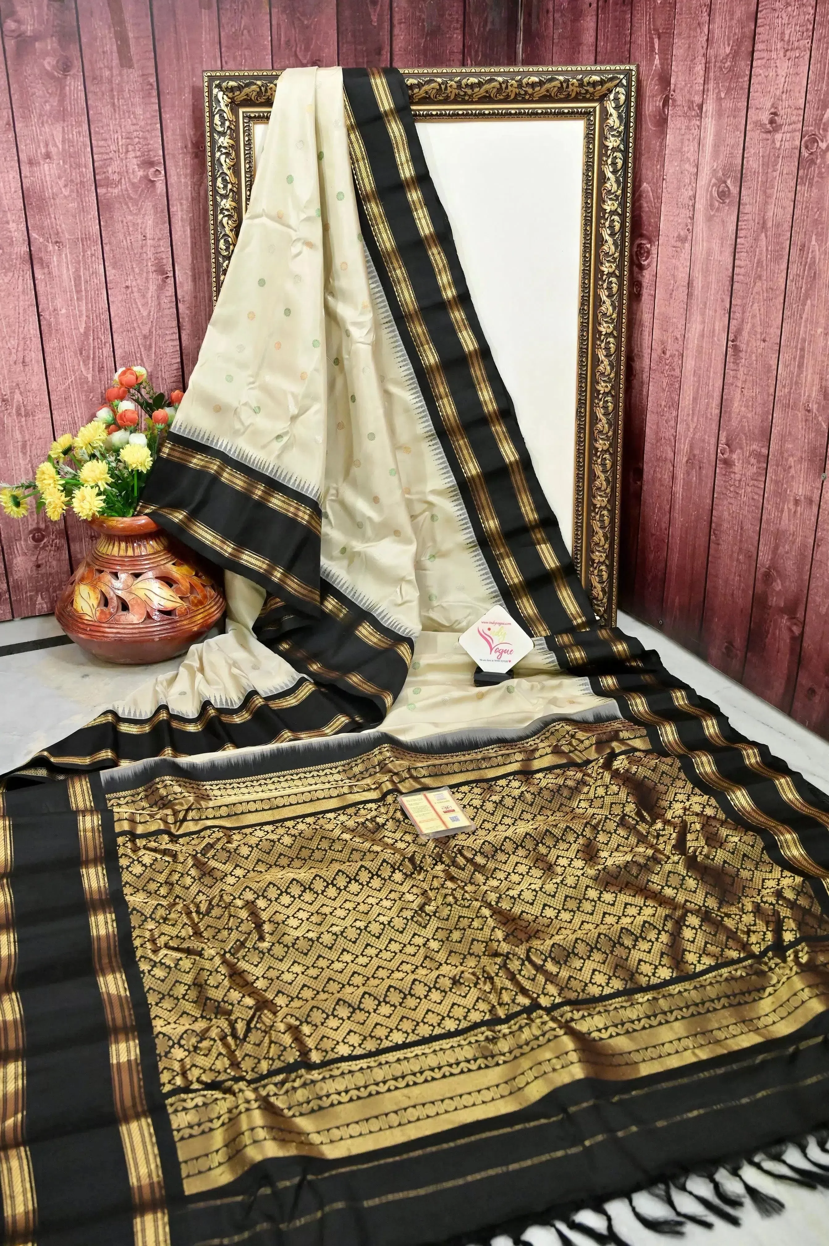 Offwhite and Black Color Pure Gadwal Silk Saree with Silver and Golden Zari Butta Work