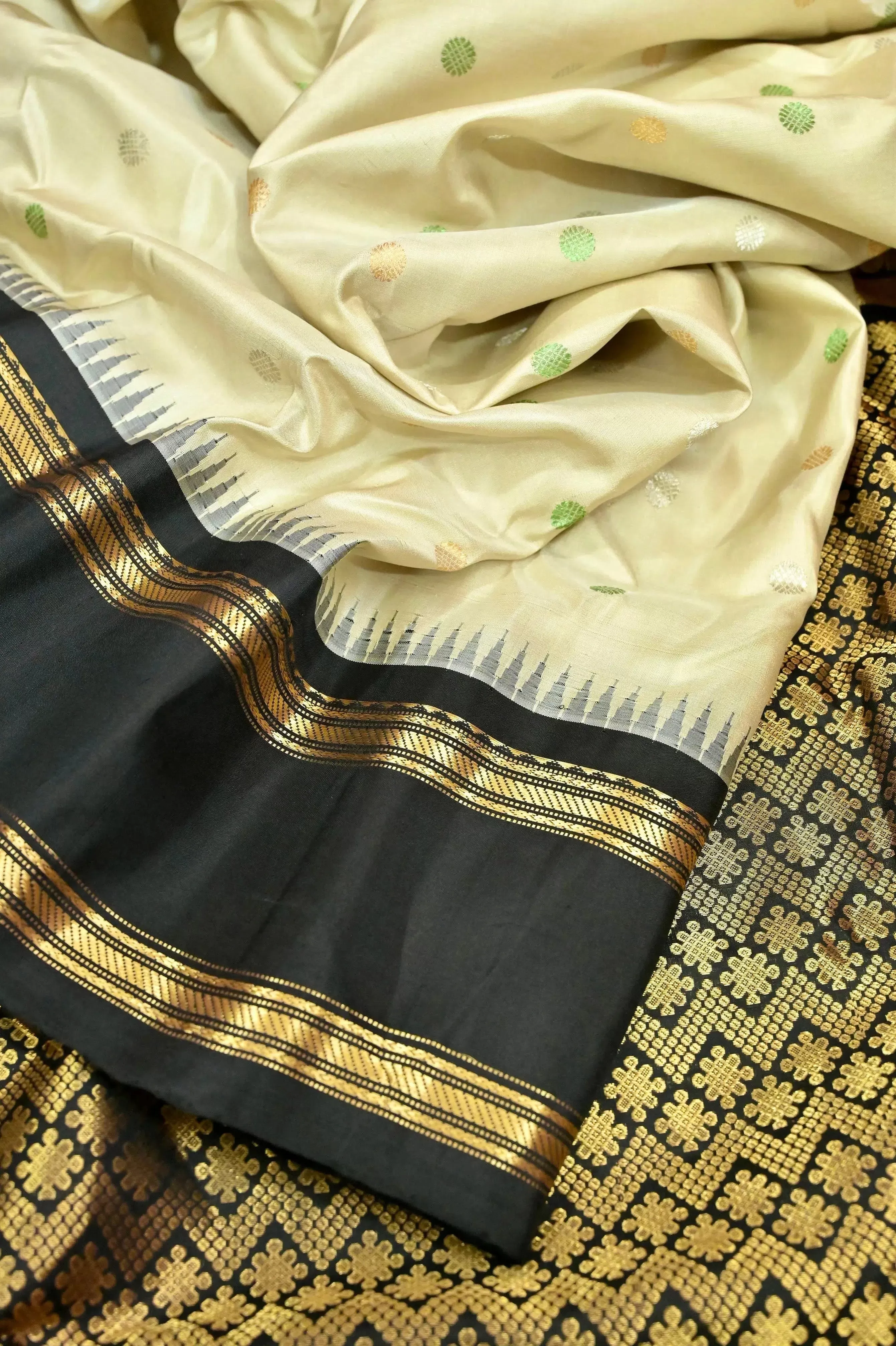 Offwhite and Black Color Pure Gadwal Silk Saree with Silver and Golden Zari Butta Work